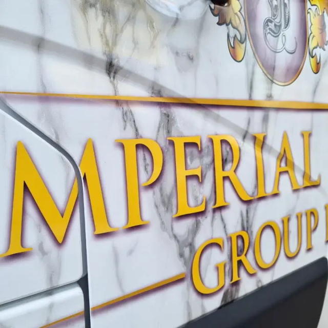 imperial stone close up of logo on marble effect full lorry wrap