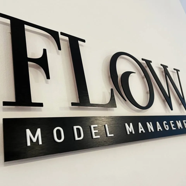 flow model management reception signage laser cut letters
