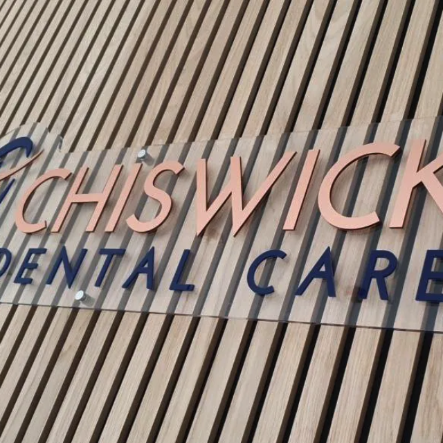 chiswick dental care transparent acrylic wall sign