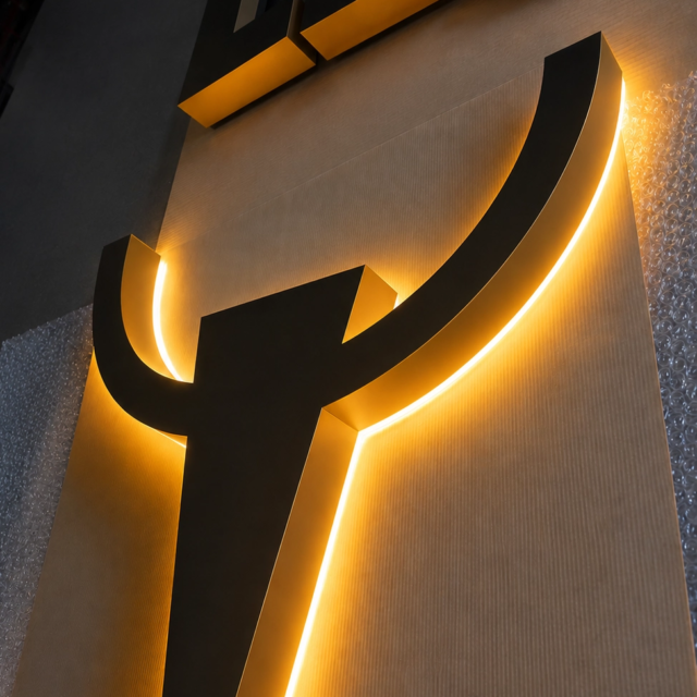 backlit-logo-sign backlit logo for butchers in london with warm light