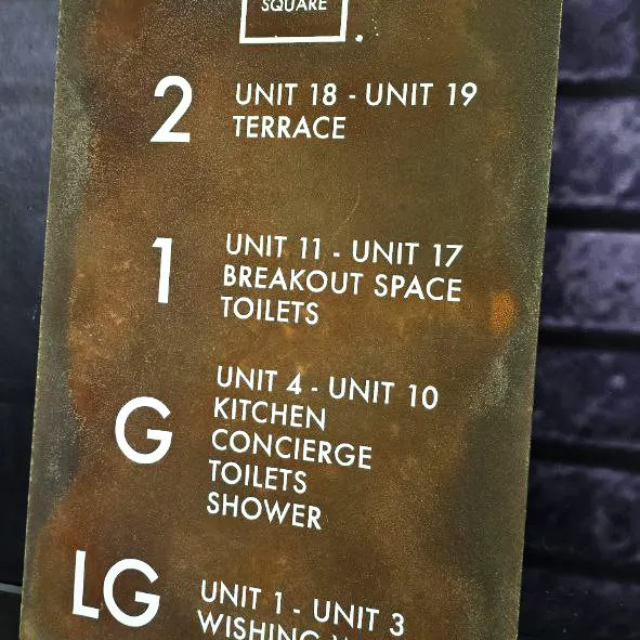 victoria park square bespoke rusted wayfinding sign