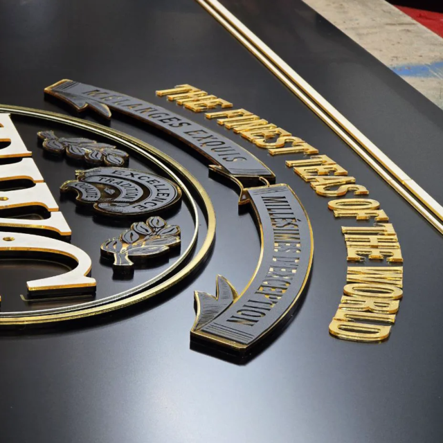 tea room black and gold laser cut letters