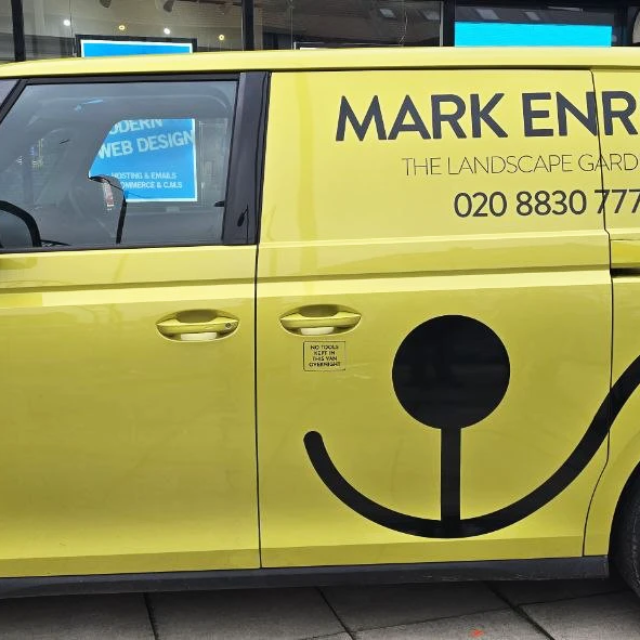 mark enright black vinyl to green body van signage