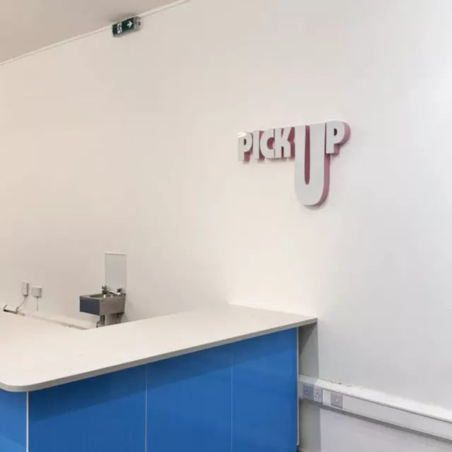food pickup wall sign