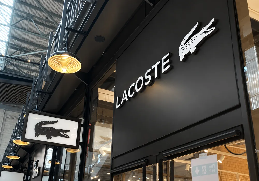 lacoste retail shop front sign