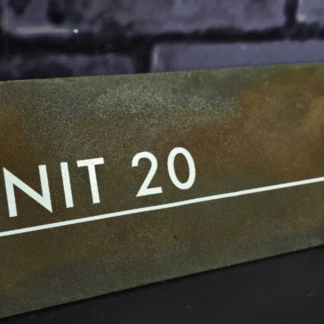 unit 20 custom rusted wayfinding sign