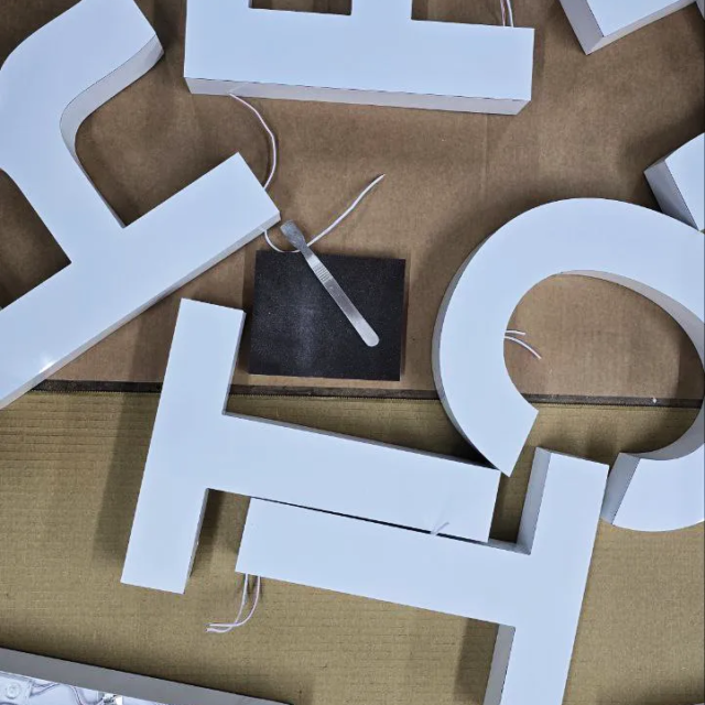 custom in house white built up letters